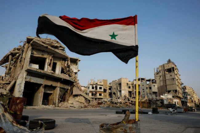 siria bandera bombardeo destruccion